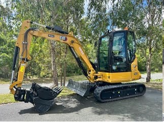 CAT mini excavator on rural Brisbane block — Minespec Plant Hire